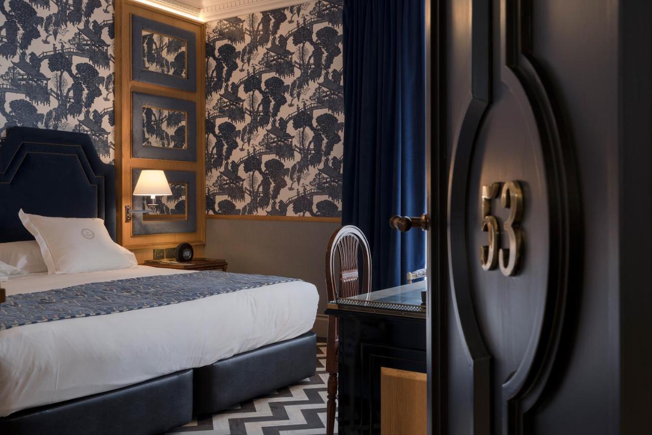 Relais & Chateaux Heritage Hotel Madrid Ngoại thất bức ảnh A room at the hotel