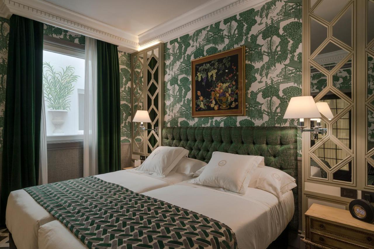 Relais & Chateaux Heritage Hotel Madrid Ngoại thất bức ảnh A bedroom at the hotel